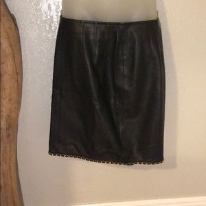 Melanzona black leather skirt - gold chain size 10